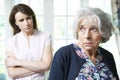 Serious Senior Woman With Adult Daughter At Home Royalty Free Stock Photo