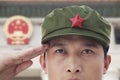 Serious Soldier Saluting, Close up, China Stars in Background