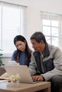 Serious stressed asian senior old couple worried about bill discuss unpaid bank debt paper payment worry about money Royalty Free Stock Photo