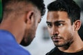 Serious, strong and fit male athletes staring, facing and looking tough. Closeup face of two men ready to challenge and