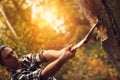 Serious and strong lumberjack chopping wood Royalty Free Stock Photo