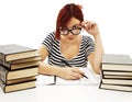 Serious student girl looking over the top of her glasses