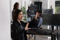 Serious system engineer working with hologram and coding language Royalty Free Stock Photo