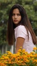 Serious Teen Girl With Flowers Royalty Free Stock Photo