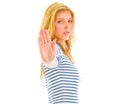 Serious teen girl showing stop gesture Royalty Free Stock Photo