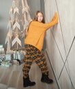 Teen girl standing in her room on Christmas eve Royalty Free Stock Photo