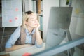 Thoughtful office woman at work