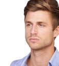 Serious thoughts. Closeup of handsome young man thinking seriously about something. Royalty Free Stock Photo