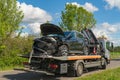 An accident car has been loaded onto a tow truck. Royalty Free Stock Photo