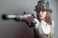 Serious Victorian Steampunk girl with gun
