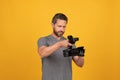 serious videographer making video. movie maker make vlog. filmmaker hold videocamera. Royalty Free Stock Photo