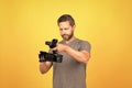 serious videographer making video. movie maker make vlog. filmmaker hold videocamera. Royalty Free Stock Photo