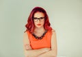 Serious woman, arms folded.looking at you Royalty Free Stock Photo