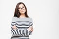 Serious woman in glasses and arms folded Royalty Free Stock Photo