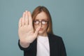 Serious woman showing stop signal isolated. Royalty Free Stock Photo