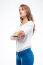 Serious woman standing with arms folded Royalty Free Stock Photo