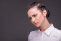 Serious woman wearing white blouse Royalty Free Stock Photo