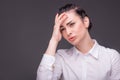 Serious woman wearing white blouse Royalty Free Stock Photo