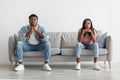 Young married black couple ignoring each other after having fight Royalty Free Stock Photo