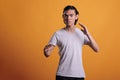 Serious young asian man standing in karate fighting pose Royalty Free Stock Photo