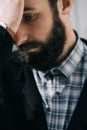 Serious young bearded man thinking about something. problem concept Royalty Free Stock Photo