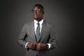 Serious young black man with glasses and gray business suit Royalty Free Stock Photo