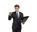 Serious young businessman with clipboard writing Royalty Free Stock Photo