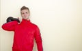 Serious young man (personal trainer or athlete) in tracksuit Royalty Free Stock Photo