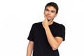 Serious young man rubbing chin Royalty Free Stock Photo