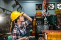 Components factory female staff hold helmet