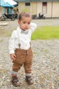 Seriously thinking adorable toddler boy in shirt with bowtie Royalty Free Stock Photo