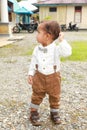 Seriously thinking adorable toddler boy in shirt with bowtie Royalty Free Stock Photo