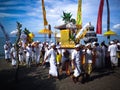 Villagers Bring Pratima Symbol Of God On The Shoulder Back To The Temple In Melasti Ceremony The Day Before Nyepi On The Beach