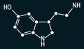 Serotonin molecule. It is monoamine neurotransmitter, neuromodulator, medication. Skeletal chemical formula on the dark blue Royalty Free Stock Photo