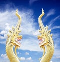 Serpent king of nagas statue on blue sky Royalty Free Stock Photo