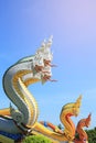 Serpent king statues in buddhist thai temple