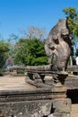 Serpent-like snake creature Phaya Naga statue in khmer ruins wat Royalty Free Stock Photo