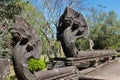 Serpent-like snake creature Phaya Naga statue in khmer ruins wat Royalty Free Stock Photo