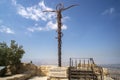 The serpentine cross sculpture, the Brazen Serpent created by Italian artist Giovanni Fantoni, on top of Mount Nebo in the