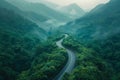 Serpentine Mountain Road Winding Through Lush Green Forest Royalty Free Stock Photo