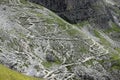 serpentine path in the Alps mountains with a zigzag pattern and Royalty Free Stock Photo