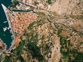 Serpentine road to the fortress of St. John on the mountain above the old town of Kotor. Montenegro. Top view Royalty Free Stock Photo