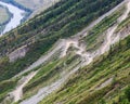 Serpentine road in the valley of the Altai Mountains in summer Royalty Free Stock Photo