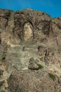 Image of Our Lady of the Good Star carved in cliff and man