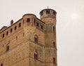 Serralunga Castle walls and tower, backlight. Color image