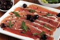 Serrano Ham with Black Olives Royalty Free Stock Photo