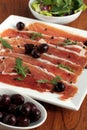 Serrano Ham and Olives Appetizer Royalty Free Stock Photo