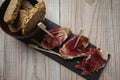 Serrano ham with toasted bread Royalty Free Stock Photo