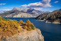 Serre Poncon Lake in Autumn with view on the Grand Morgon Peak. Hautes-Alpes, Alps, France