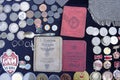 Sertificates of Don cossack serviced in Germany army in 1940s and Red Soviet army soldiers, pile of vintage coins and
